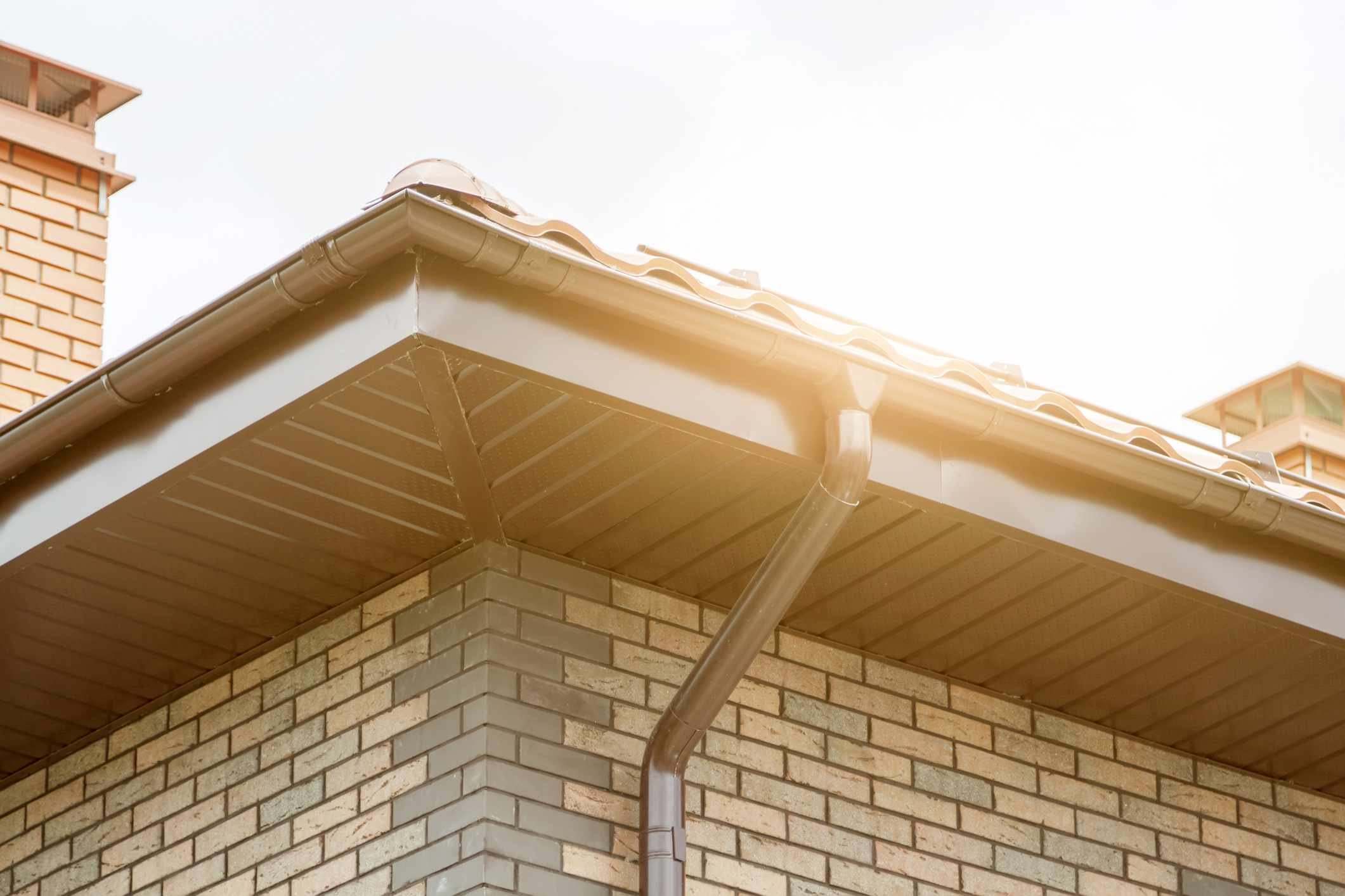New fascias, soffits and guttering on a brick house