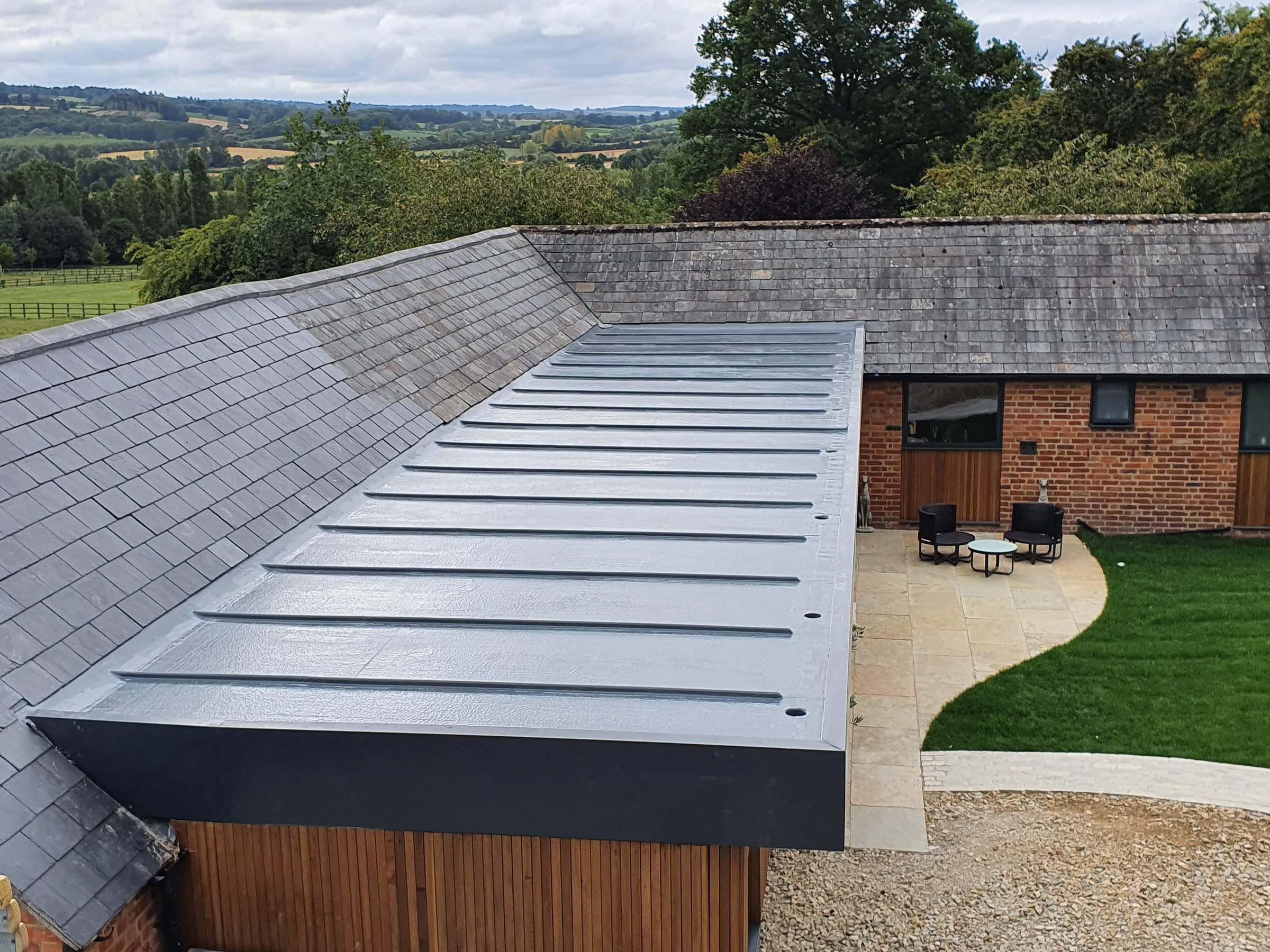 Finished flat roof with rooflights on an extension